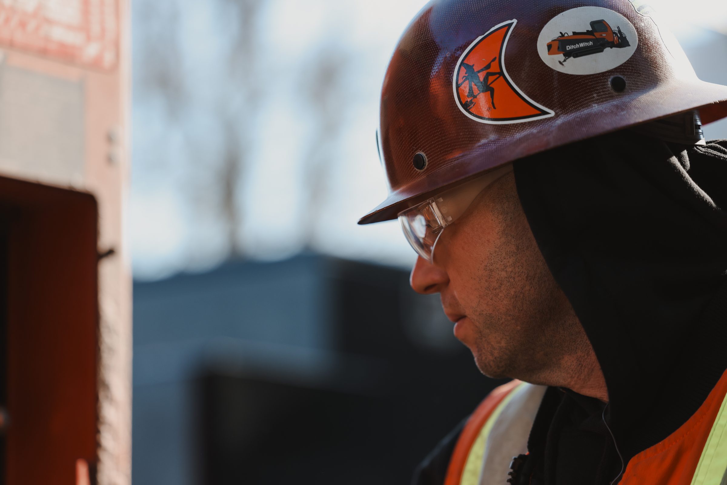 Hardhat profile with witch logo